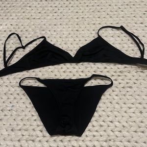 black solid and striped bikini